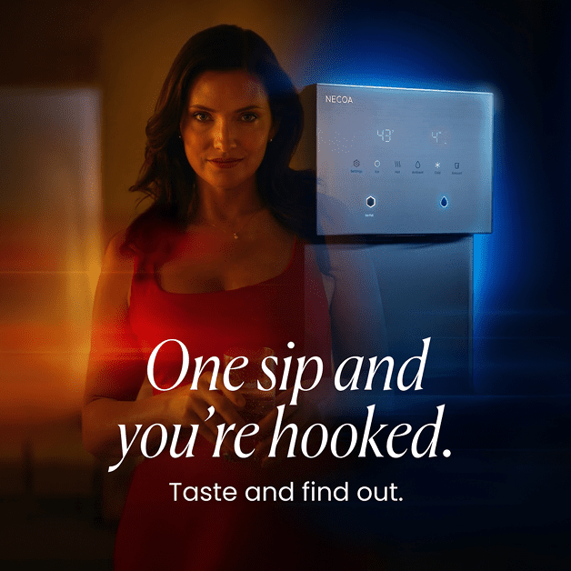 An advertisement for the NECOA water dispenser with a woman in a red dress holding a glass of water, set against a background split with warm amber and cool blue lighting. The text reads, 'One sip and you're hooked. Taste and find out.'