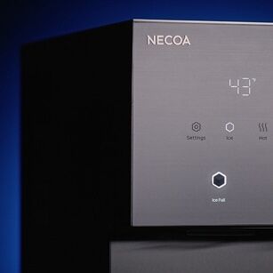 A close-up of the sleek, dark grey control panel of a NECOA water dispenser featuring a digital display of 43°F and touch-sensitive icons for Settings, Ice, Hot, and an illuminated Ice Full indicator.